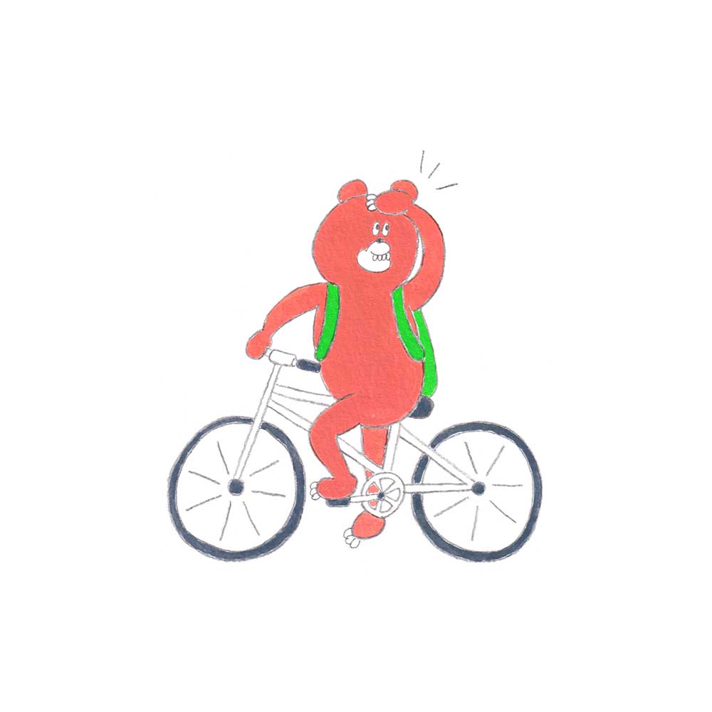かわいいくまのキャラクターが自転車に乗った手描きのイラスト